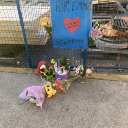 Flowers in support of one of the victims